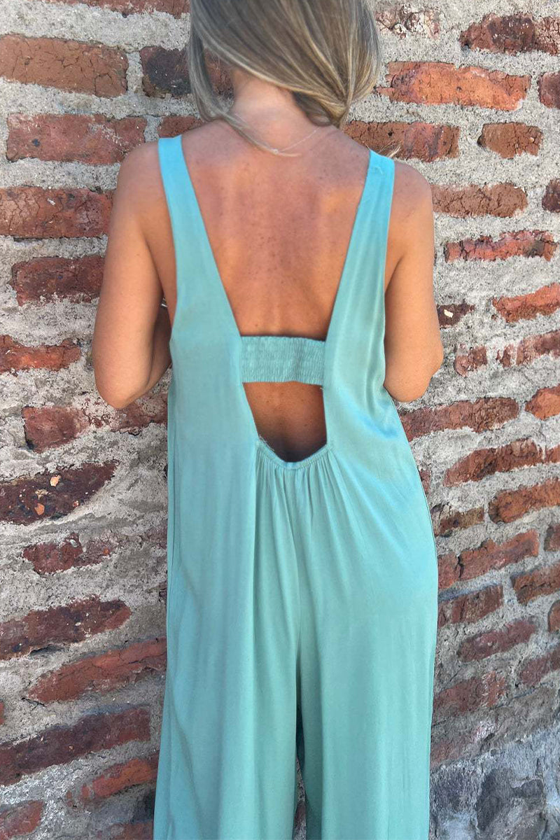 Casual jumpsuit met zakken, knopen en een open rug