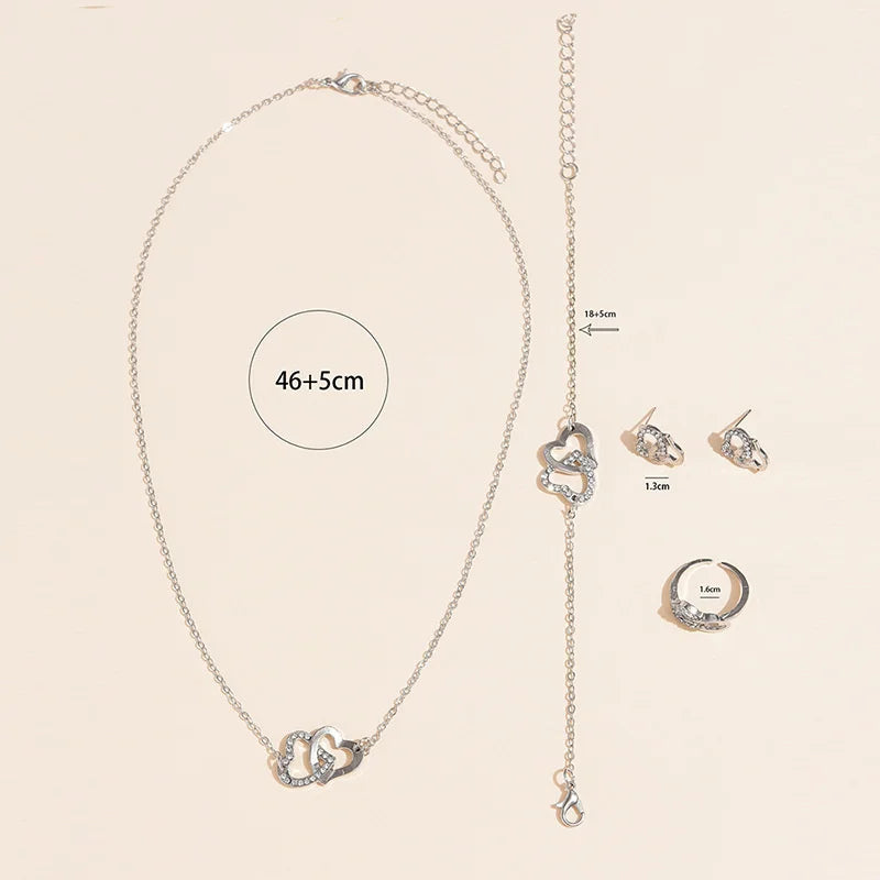 Babette | Gouden dames sieradenset met hartvormige details en strass – elegante en verfijnde uitstraling