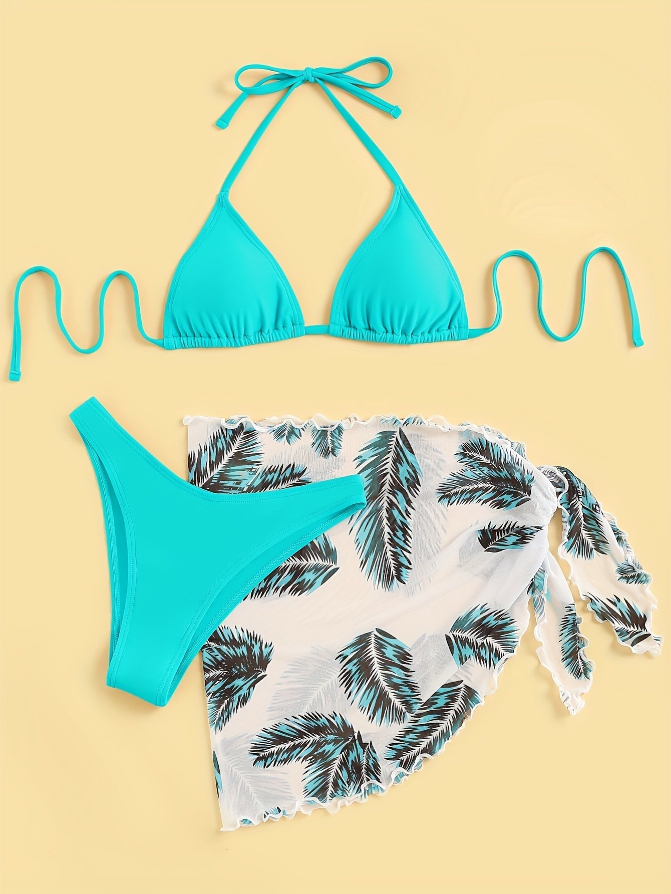 Chique Bikini Set met Bladprint en Doorschijnende Cover-Up Rok