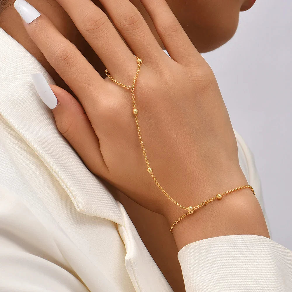 Annemarie | Gouden dames hand chain armband – verfijnd ontwerp met handring voor een luxe uitstraling