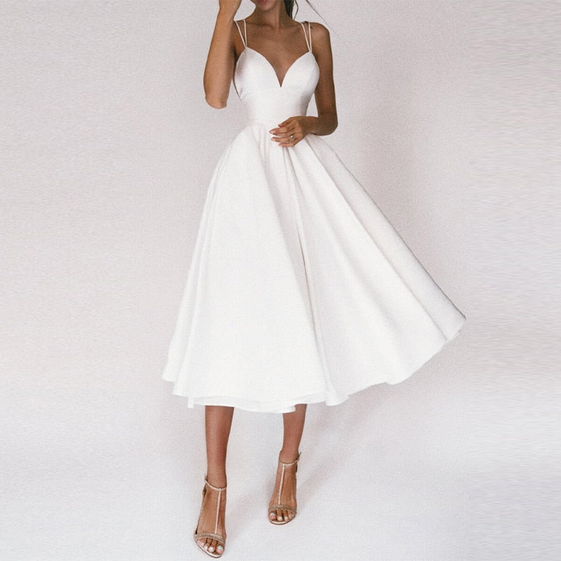 Imke | Dames midikleed met sexy kruisrug – elegant en verleidelijk design