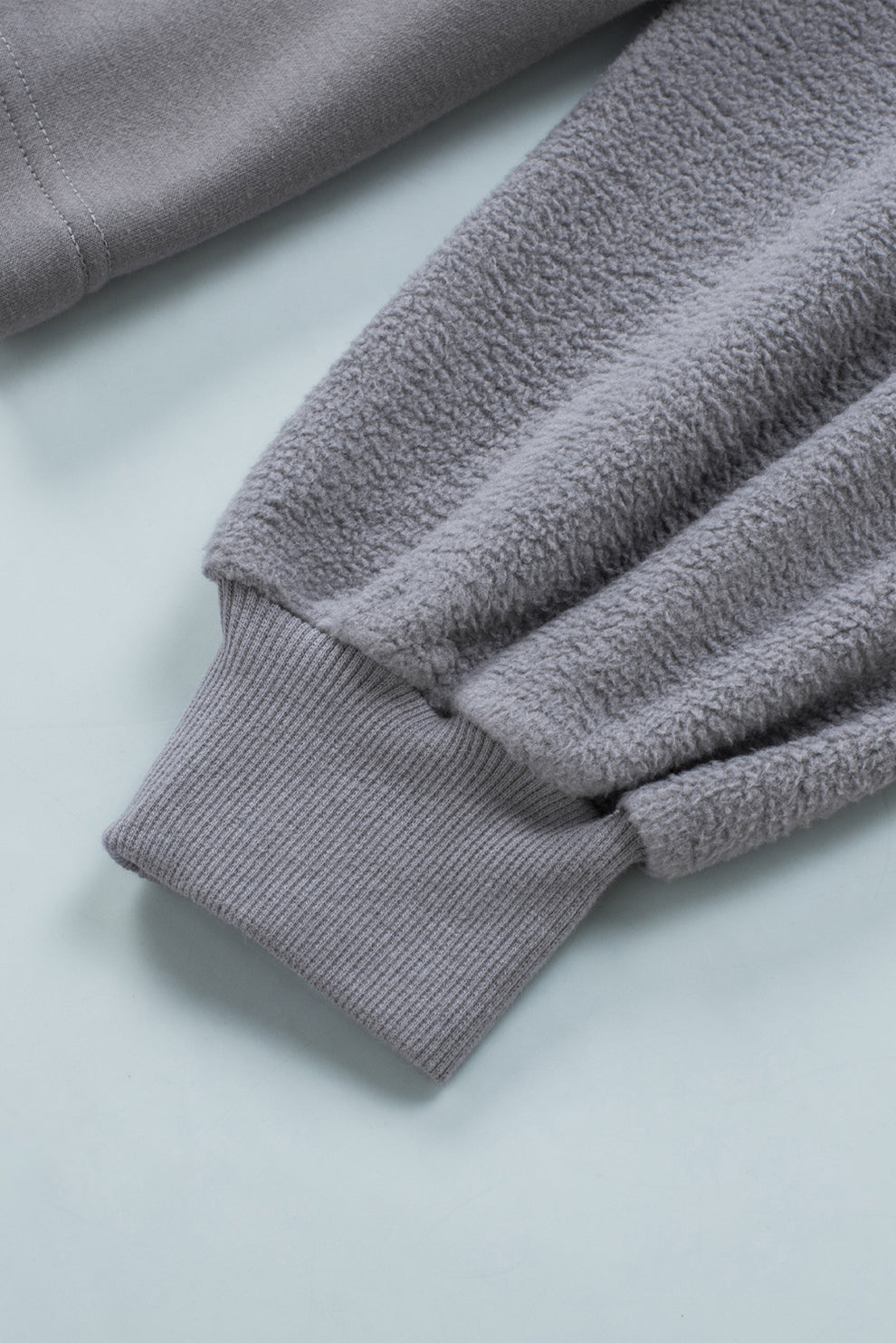 Eava jas dames | Grijze trekkoord jas met capuchon en praktische details