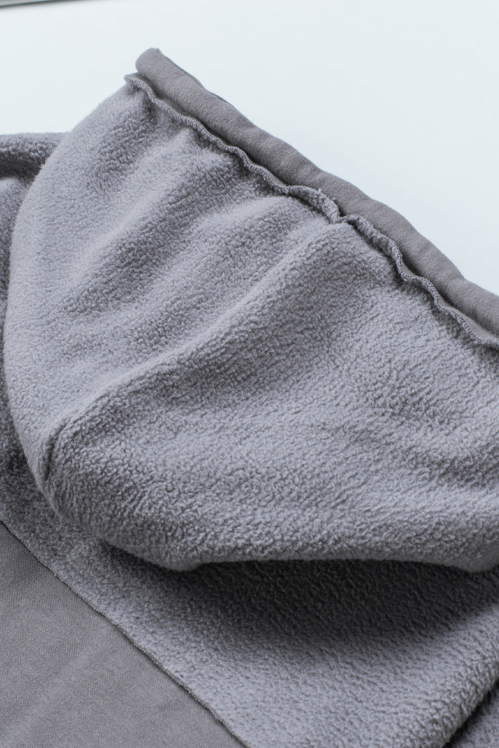 Eava jas dames | Grijze trekkoord jas met capuchon en praktische details
