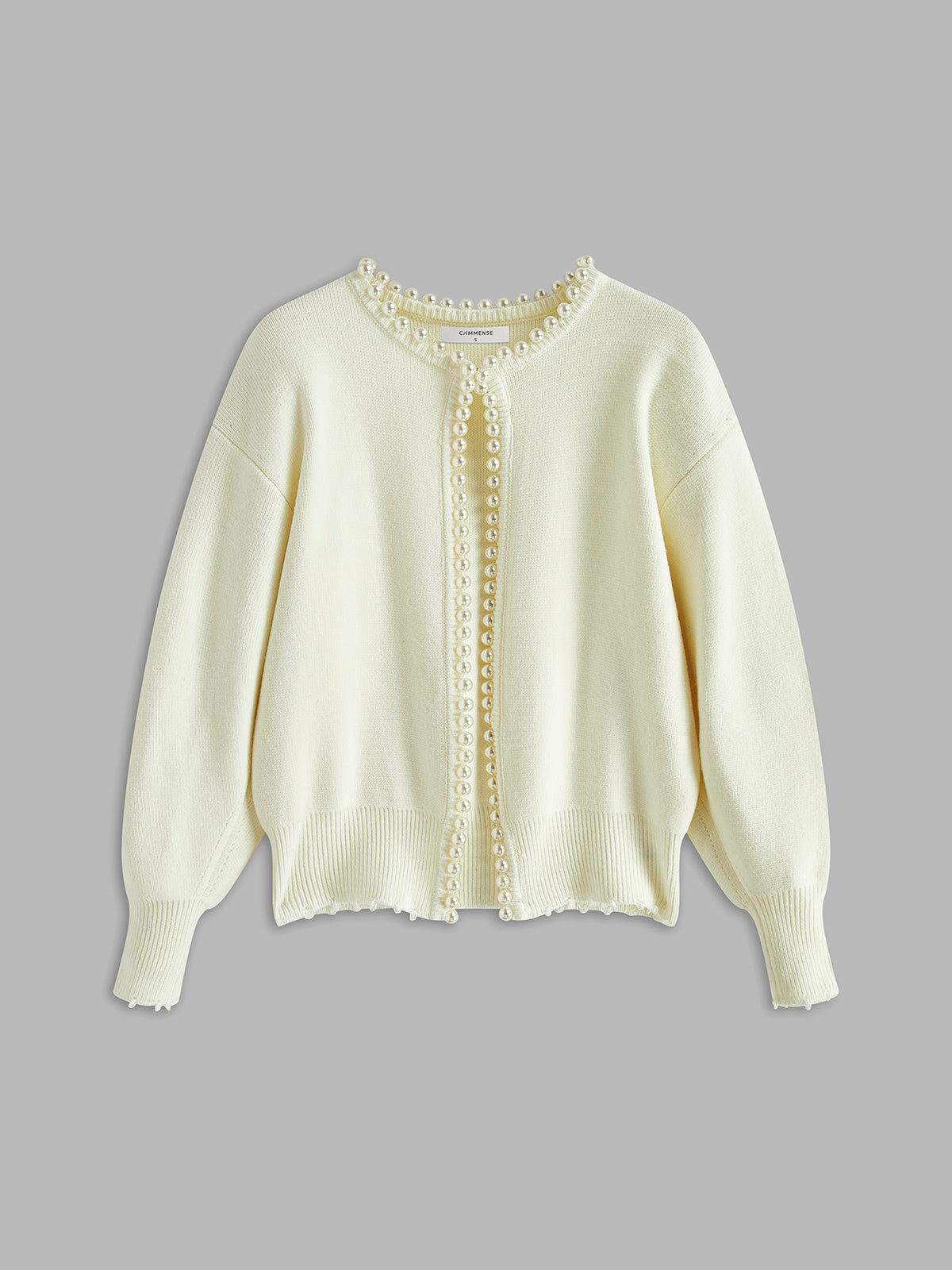 Jasmine Vest | Dames gebreid vest met parelrand en gescheurde zoom
