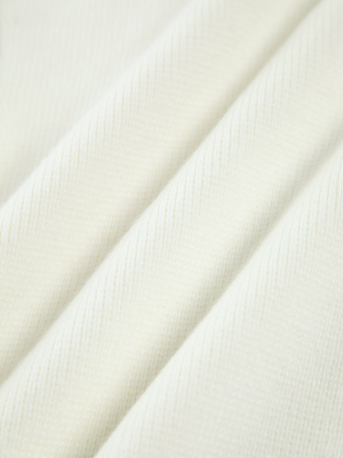 Jasmine Vest | Dames gebreid vest met parelrand en gescheurde zoom