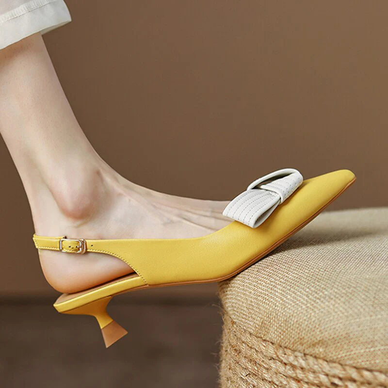 Slingback pumps met spitze neus