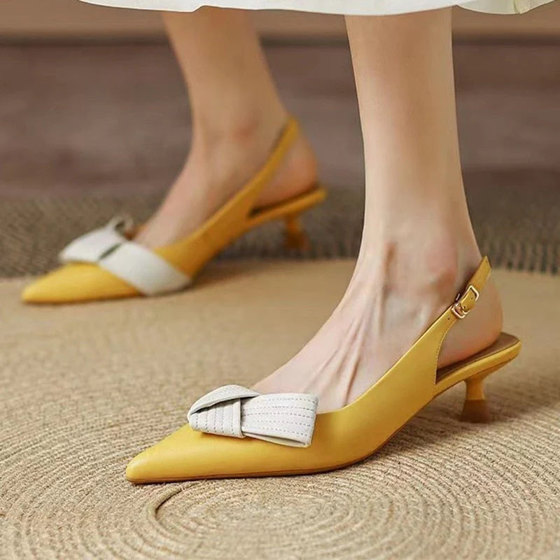 Slingback pumps met spitze neus