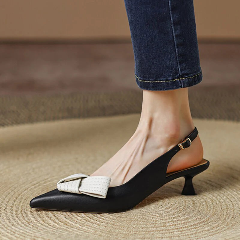 Slingback pumps met spitze neus