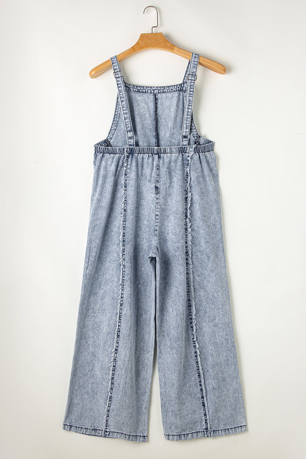 Blauwe denim overall met wijde pijpen