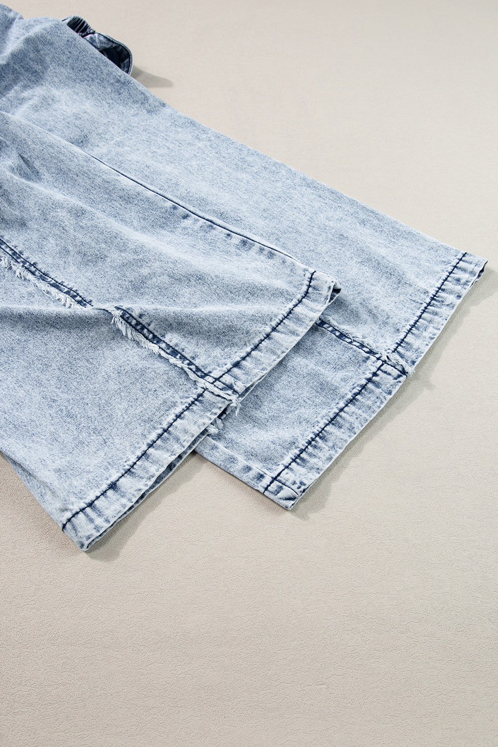 Blauwe denim overall met wijde pijpen