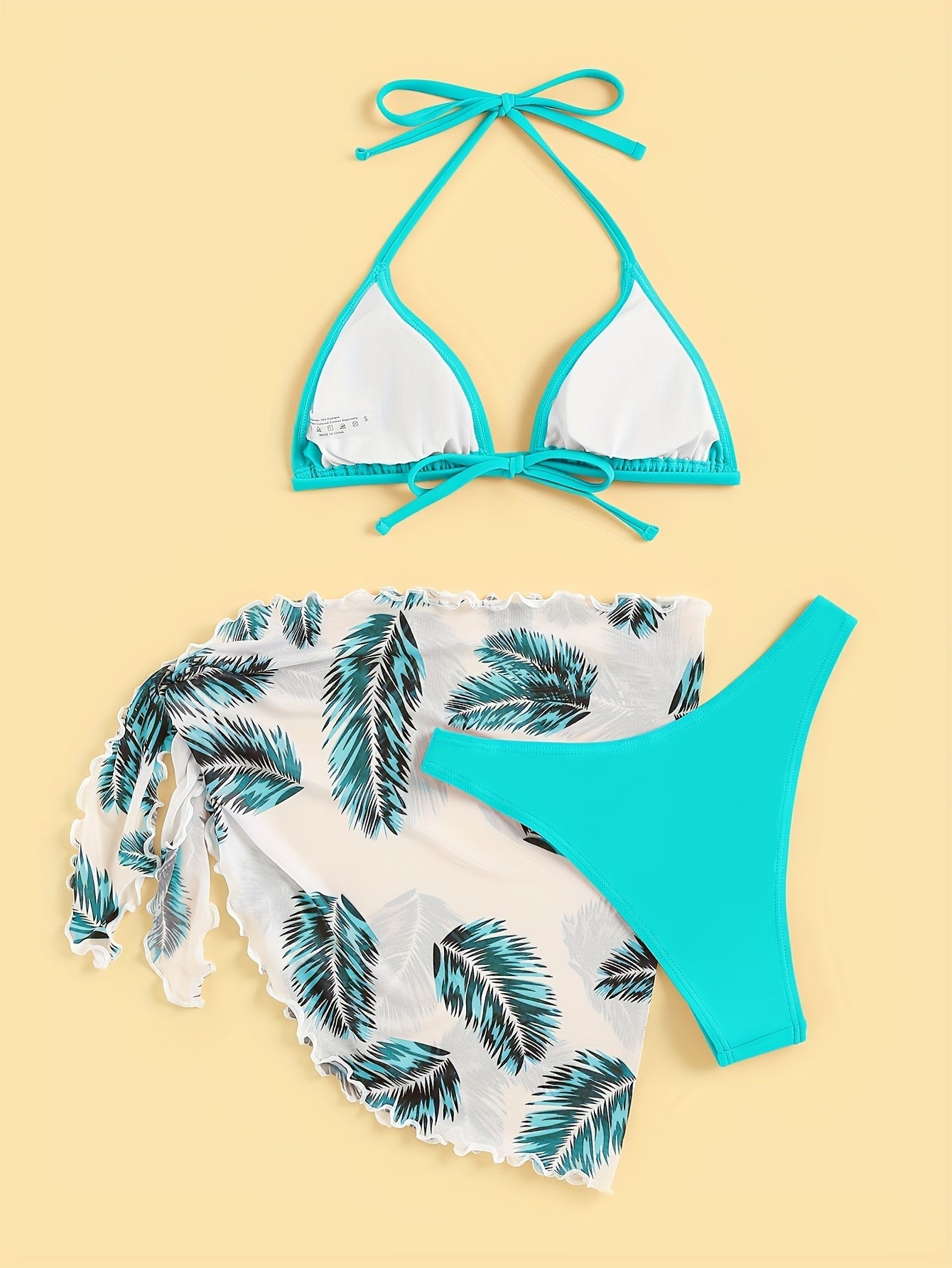 Chique Bikini Set met Bladprint en Doorschijnende Cover-Up Rok
