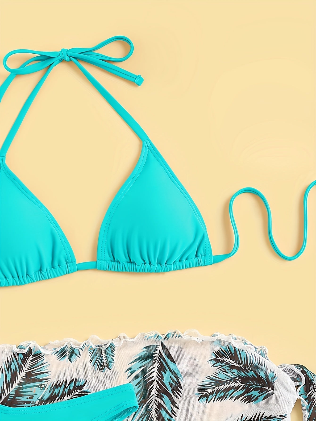 Chique Bikini Set met Bladprint en Doorschijnende Cover-Up Rok