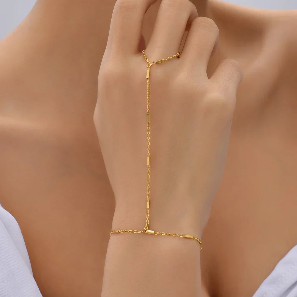 Annemarie | Gouden dames hand chain armband – verfijnd ontwerp met handring voor een luxe uitstraling