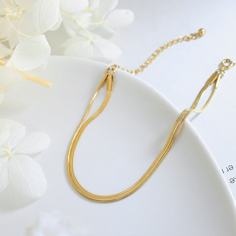 Bertha | Gouden dames dubbele armband – verfijnd ontwerp met slangenketting en glanzende afwerking
