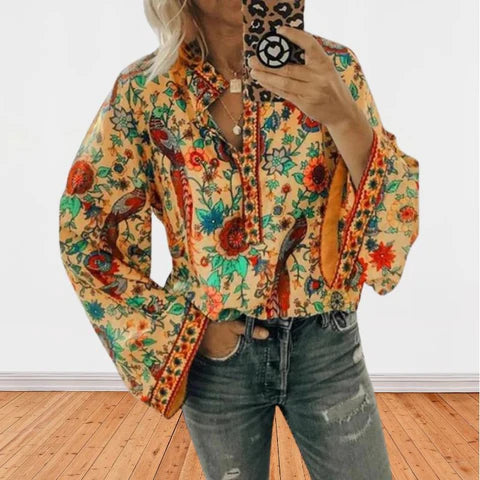 Oranje damesblouse | Bloemenprint met uitlopende mouwen en opstaande kraag