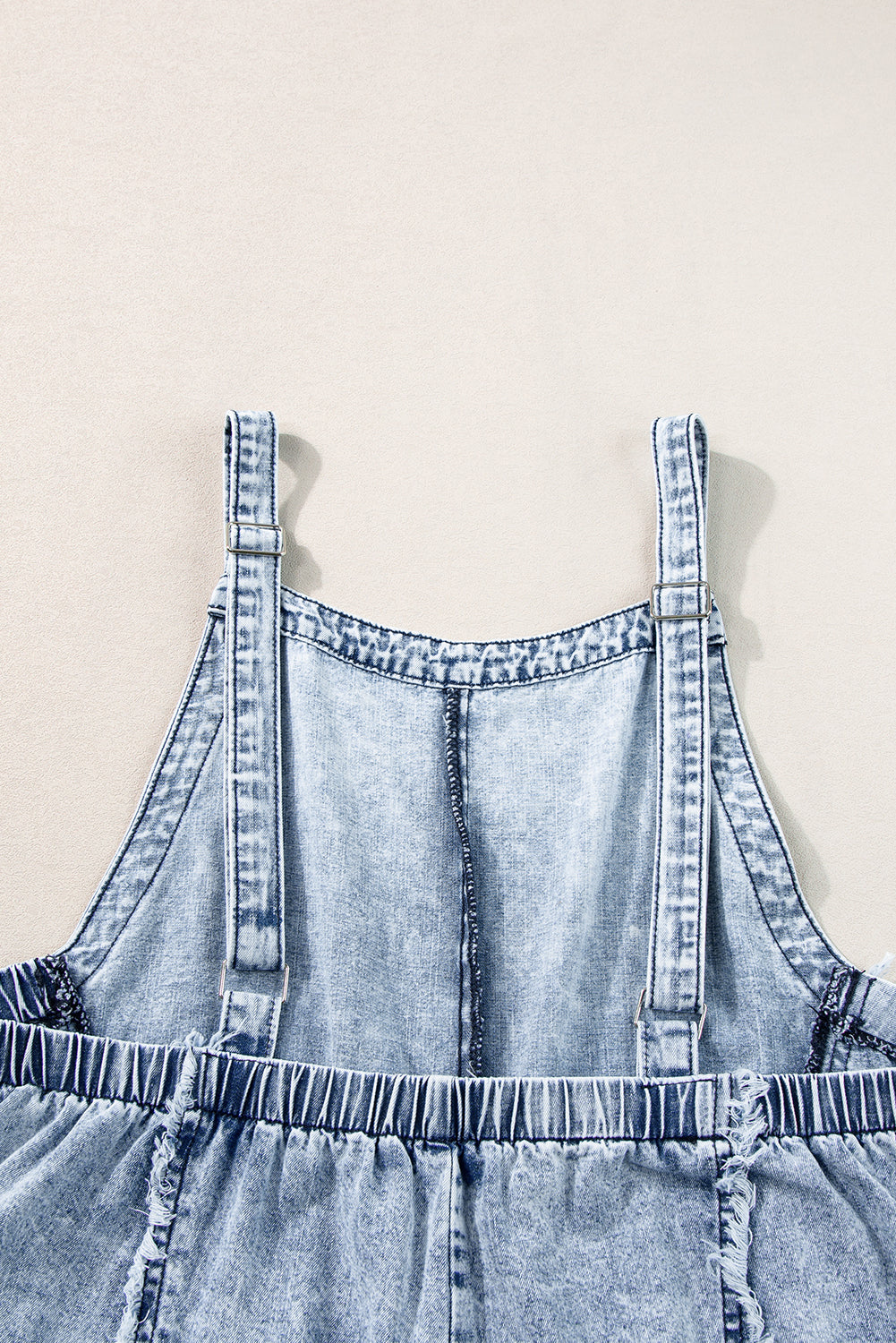 Blauwe denim overall met wijde pijpen