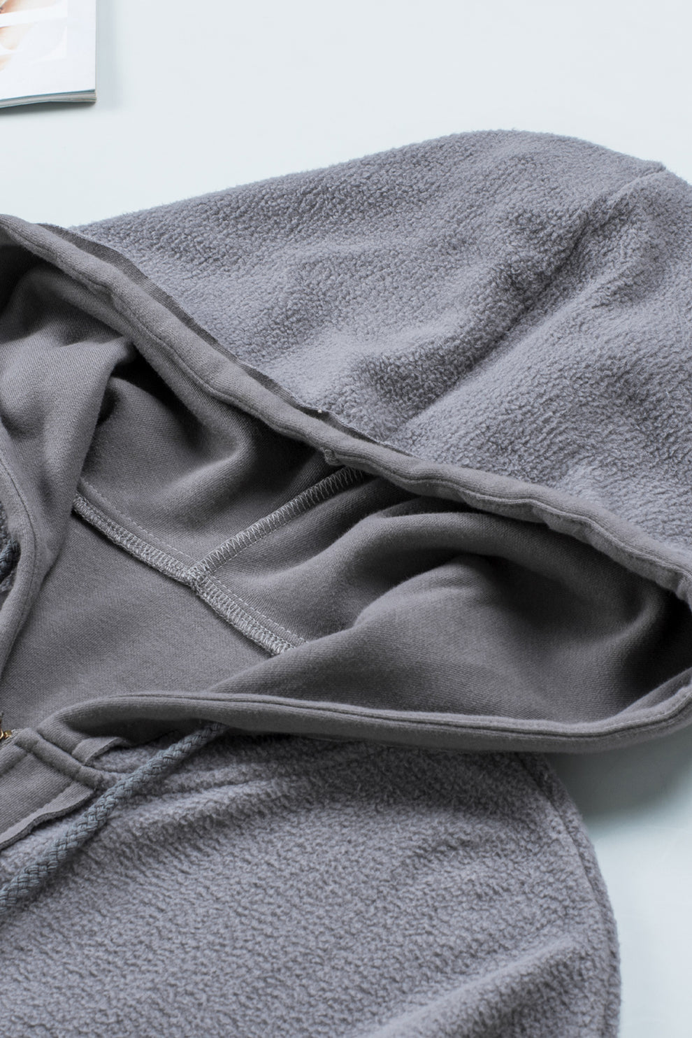 Eava jas dames | Grijze trekkoord jas met capuchon en praktische details