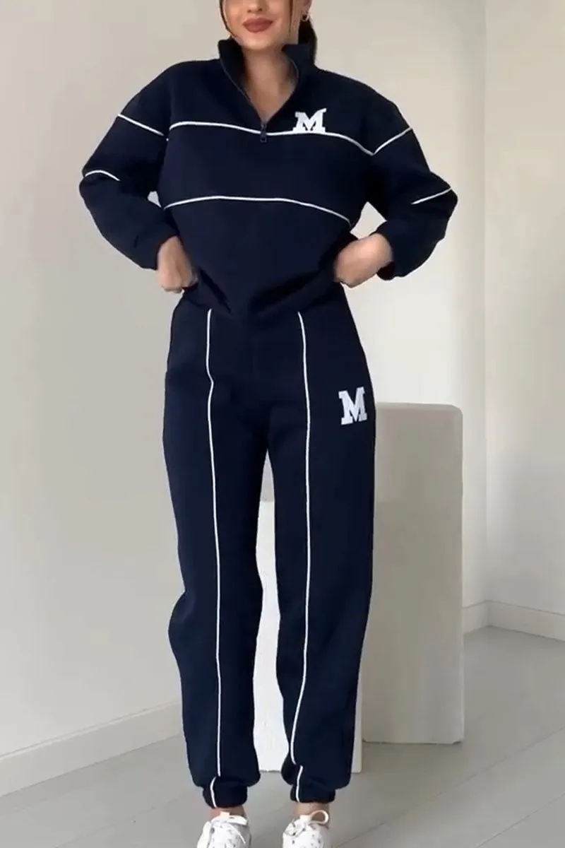 Megan Tracksuit | Dames trainingspak met halve rits en varsity-stijl